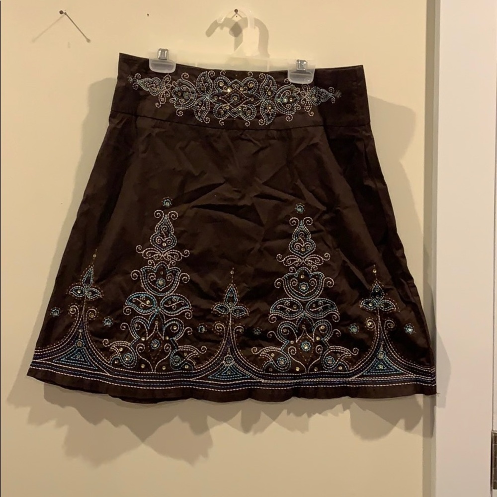 Embellished, knee length skirt
